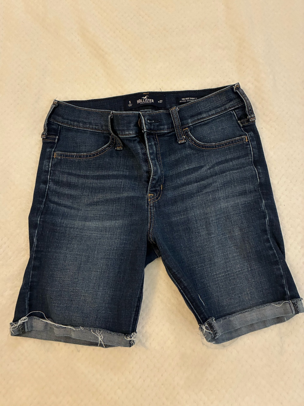 Women’s Hollister Brand Mid-Dark Indigo Rolled Hem Denim Shorts waist 27 Size 5